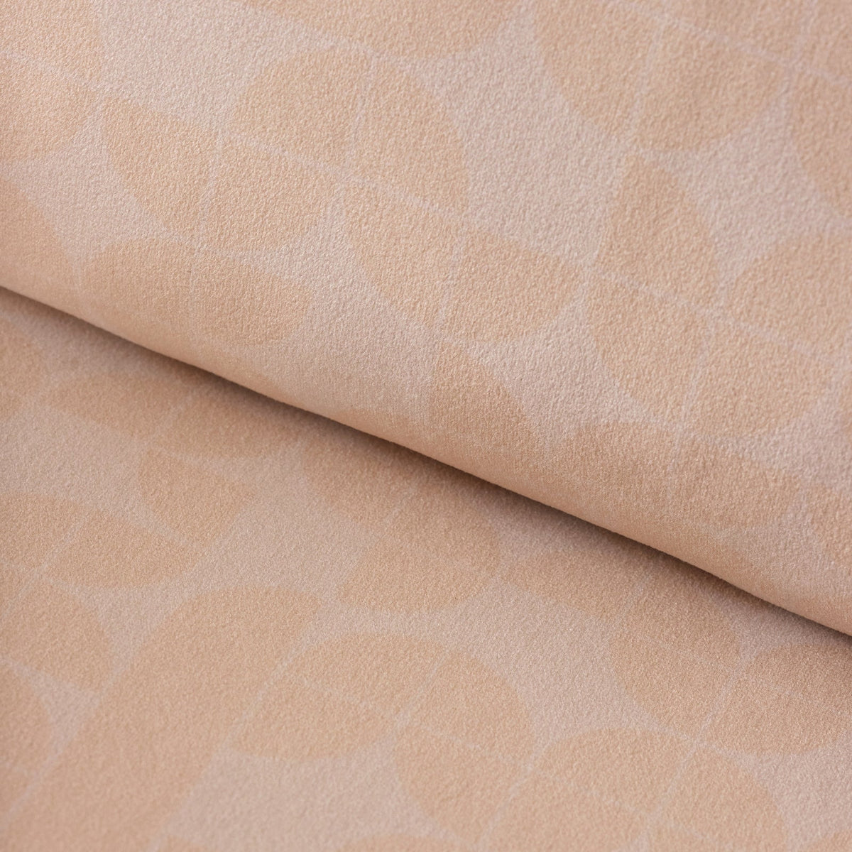 détail tissu beige fauteuil