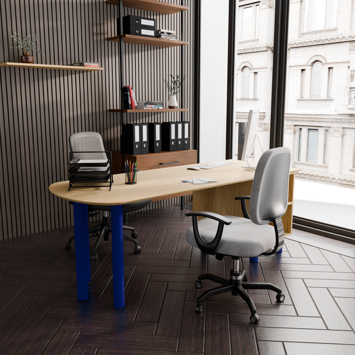 Bureau médical Praticien installé dans un cabinet avec vue sur l'espace de travail de 114,4 cm de large et le module à tiroirs côté médecin.